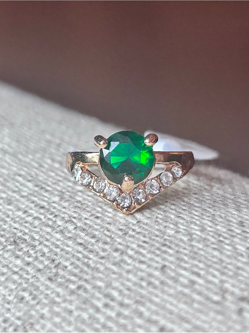 Gold Ring with Green Center Stone and Clear Accent Stones - size 7